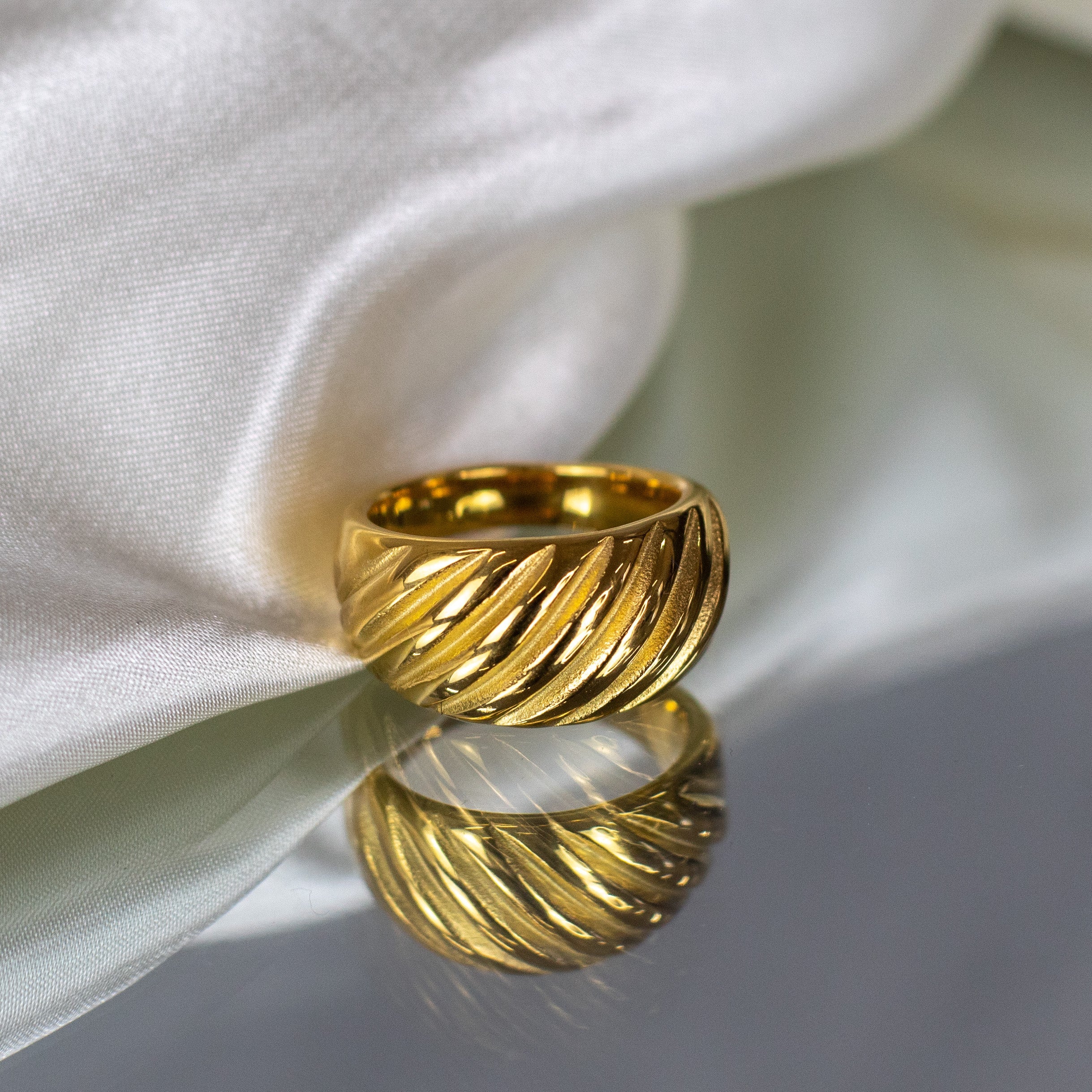 Eloise gold earrings with an eye for vintage