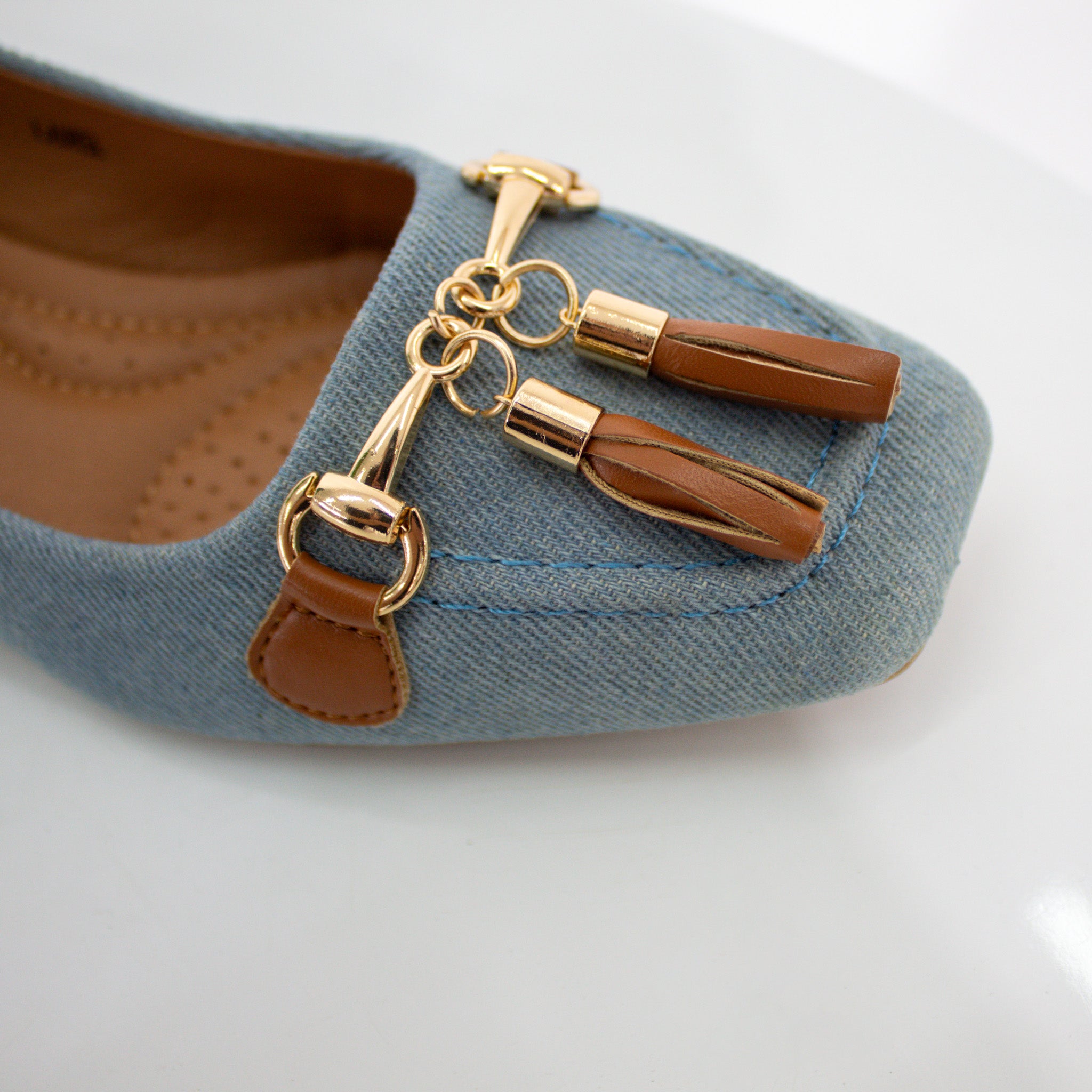 Blue tassel trim faux leather flat shoes laurel