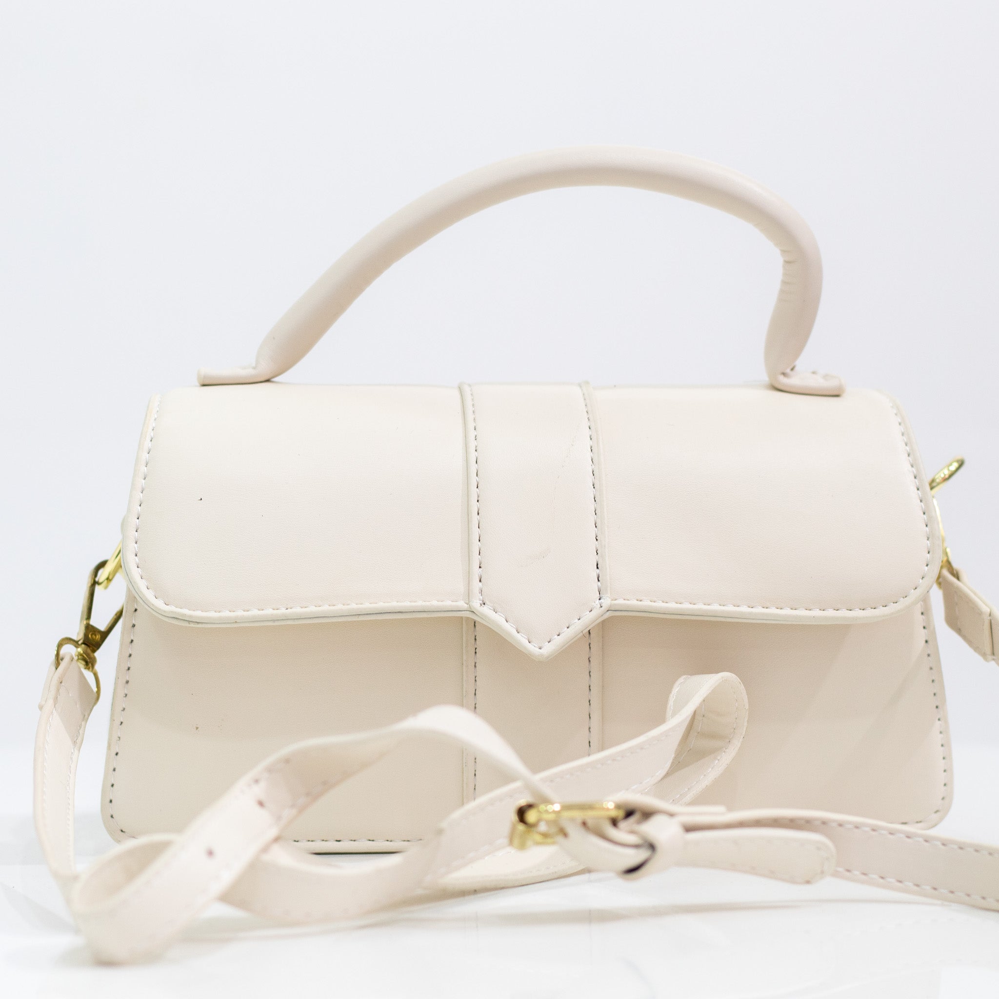 Off-whitefaux leather convertible crossbody xaris