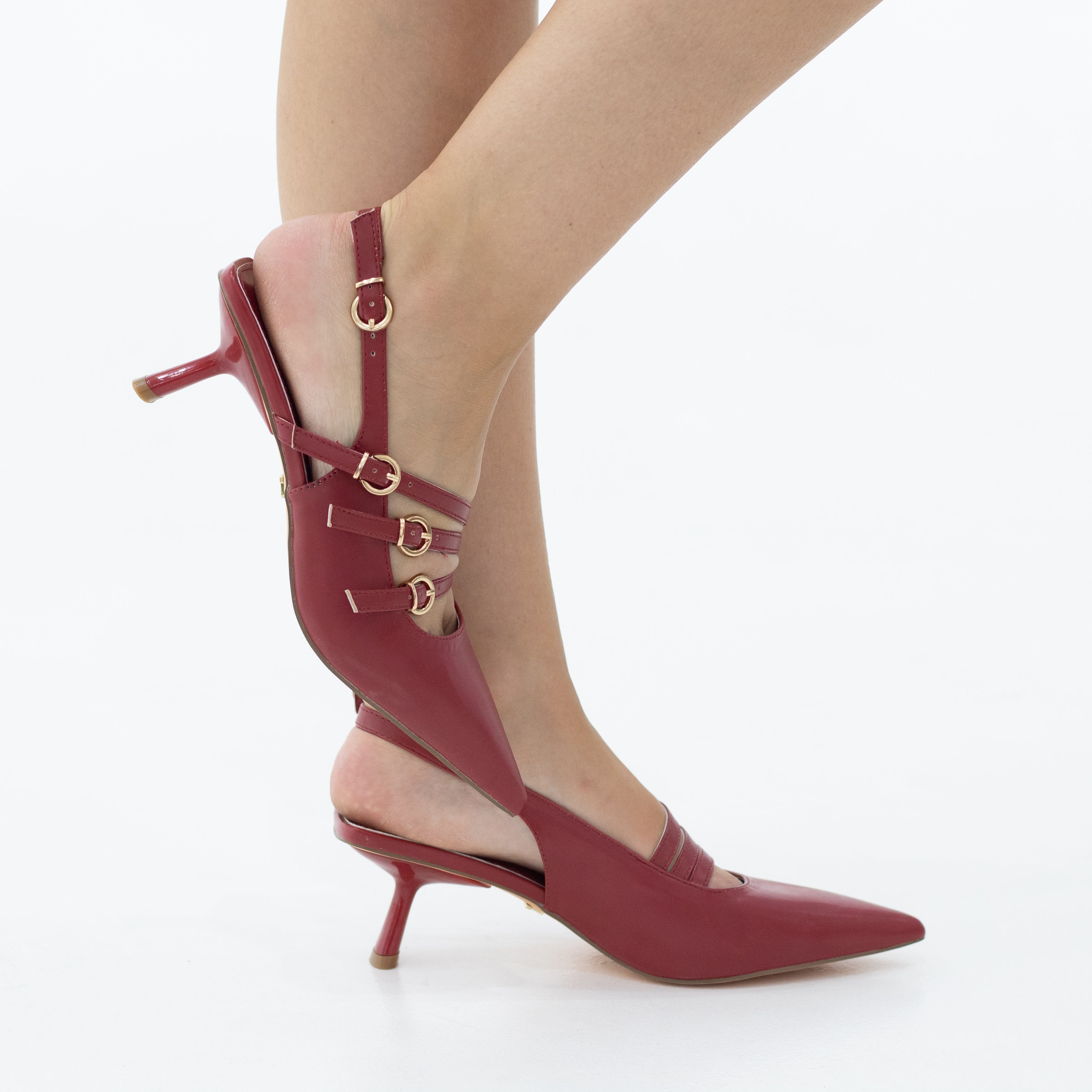 Hilma pointy sling back on a 4cm heel with a twist of side buckles finish