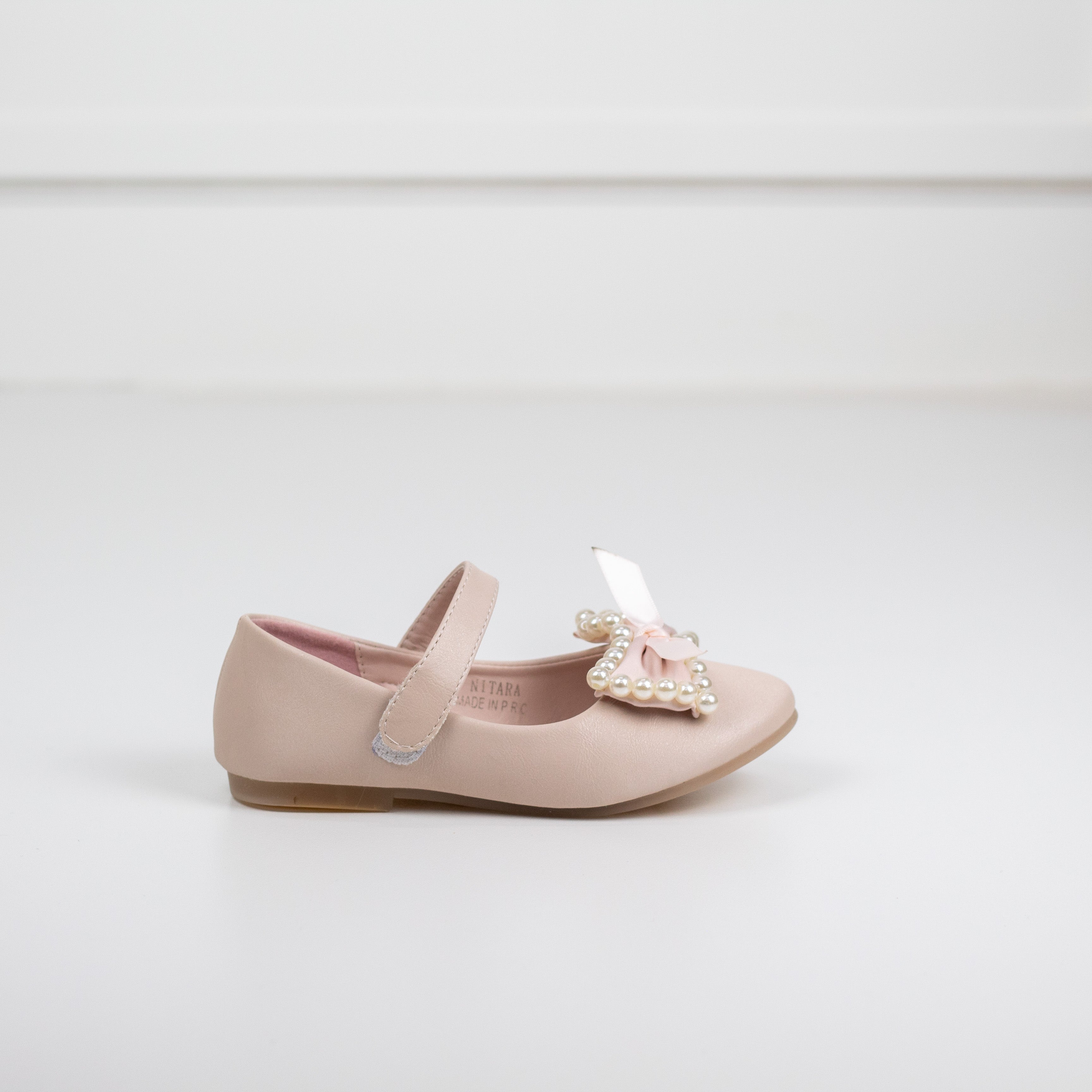 Nitara infants girls dress pump with a pearls bow pink