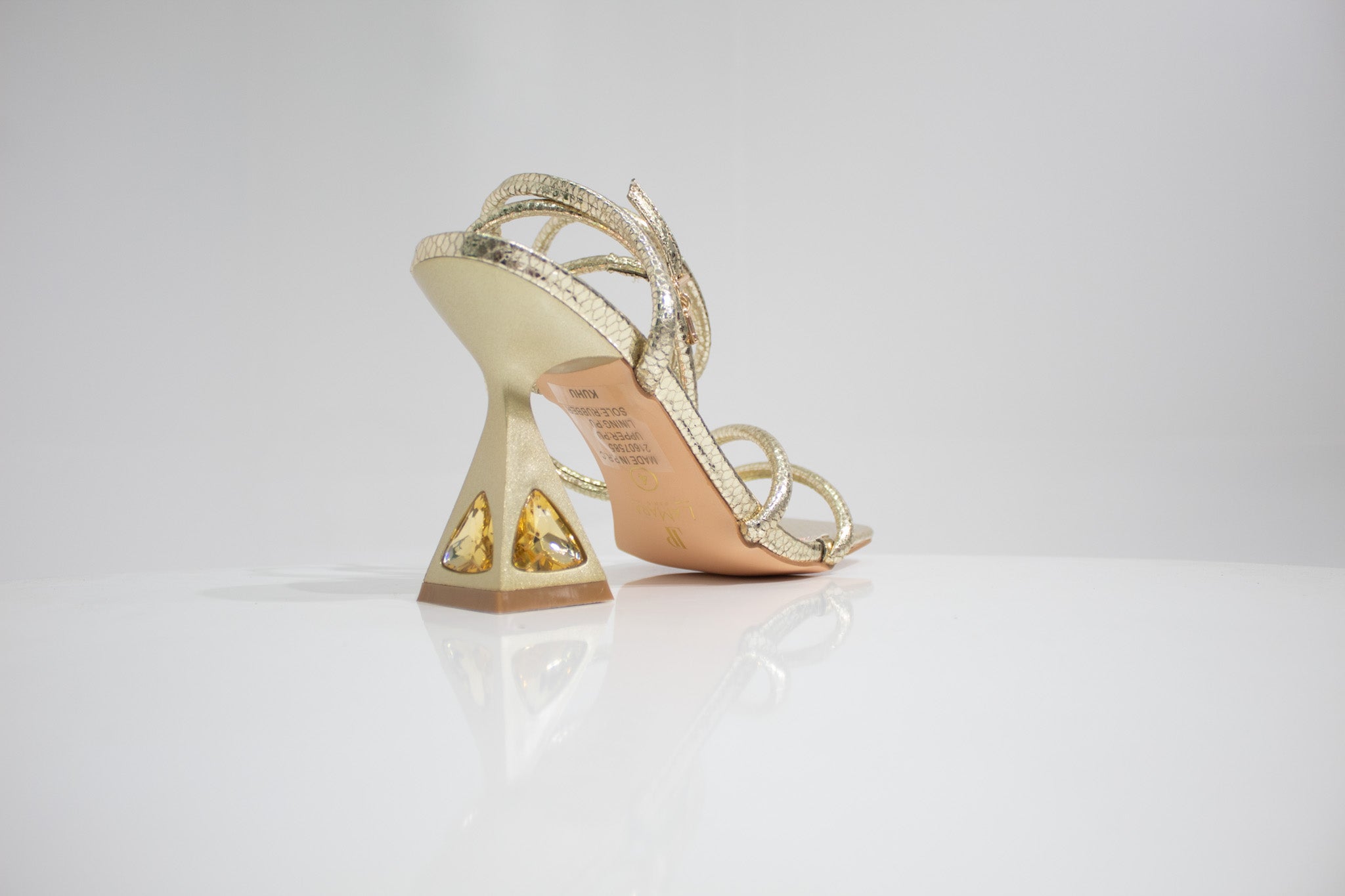 Kuhu strippy ankle strap sandal on curved heel light gold