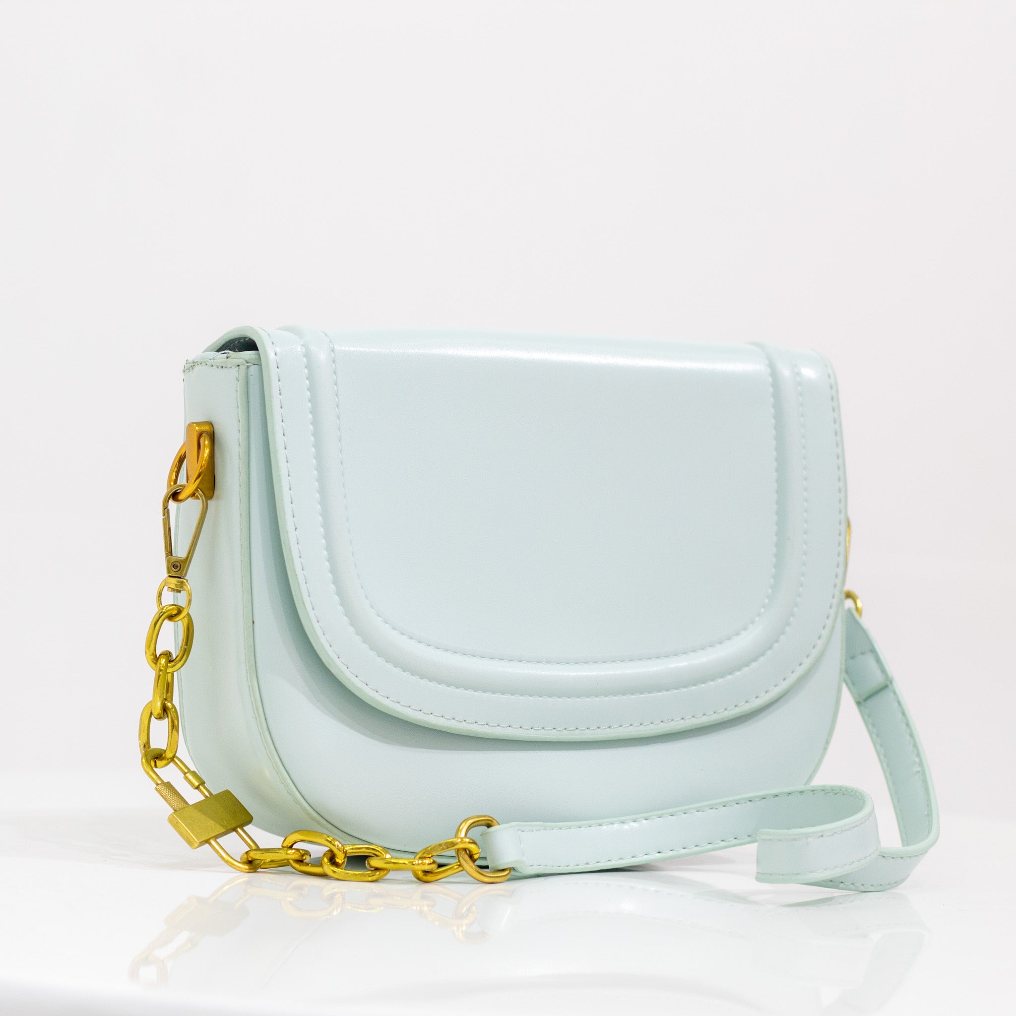 Quentin faux leather saddle bag light blue