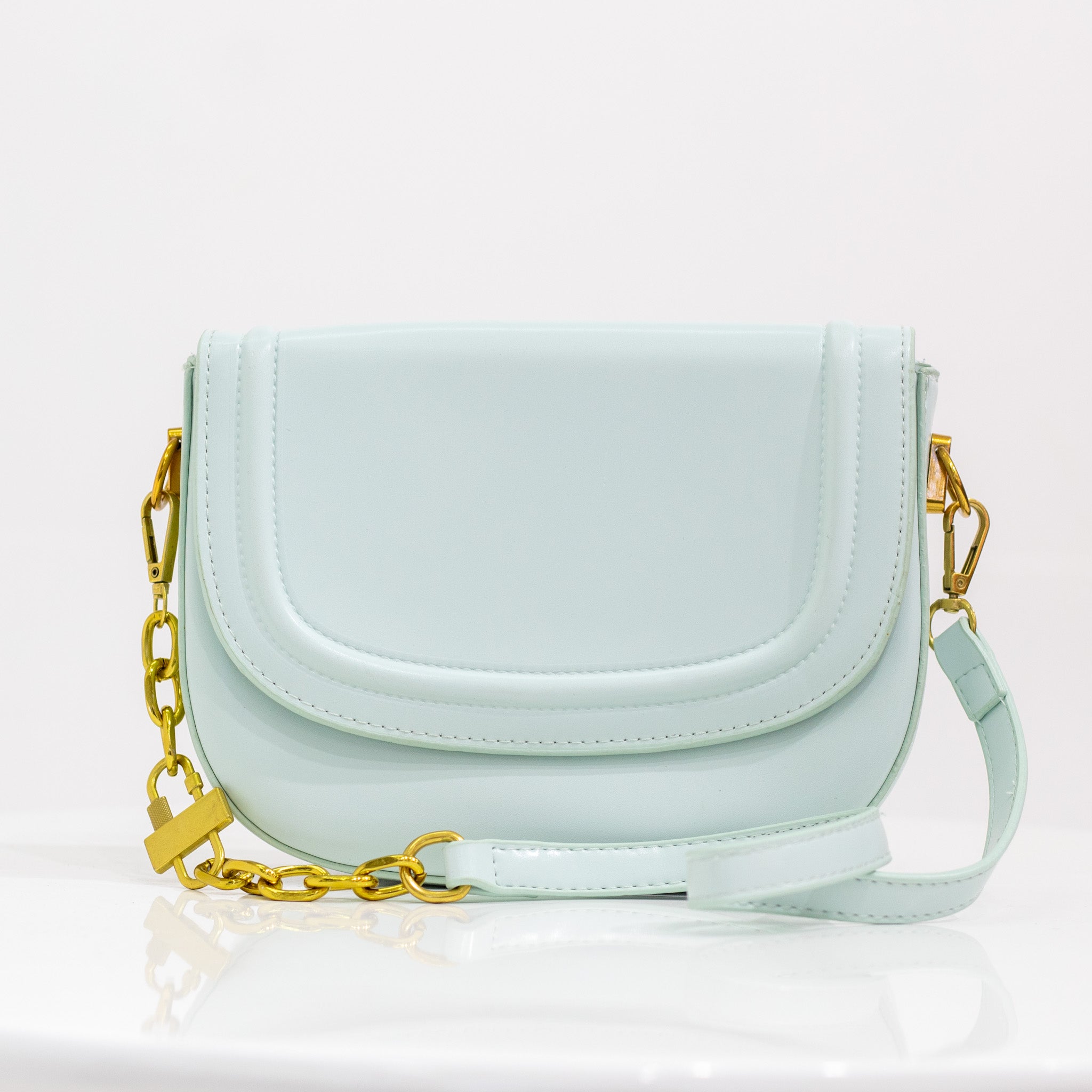 Quentin faux leather saddle bag light blue