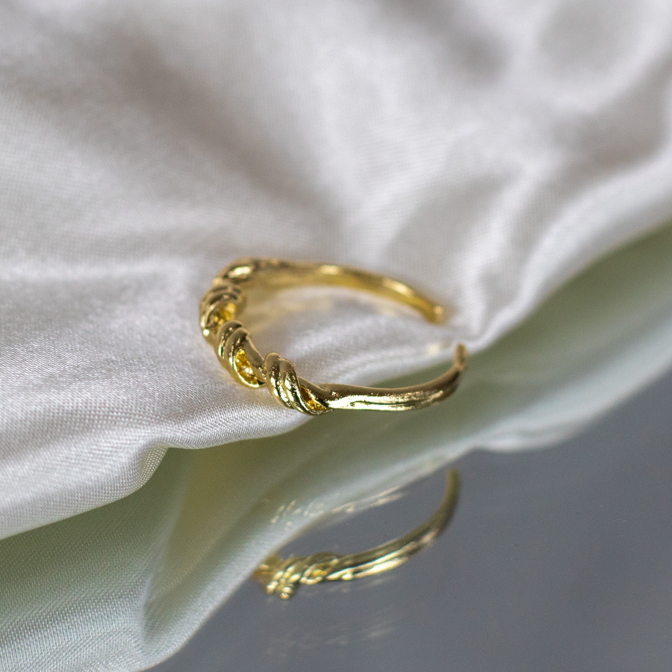 Gold twist ring