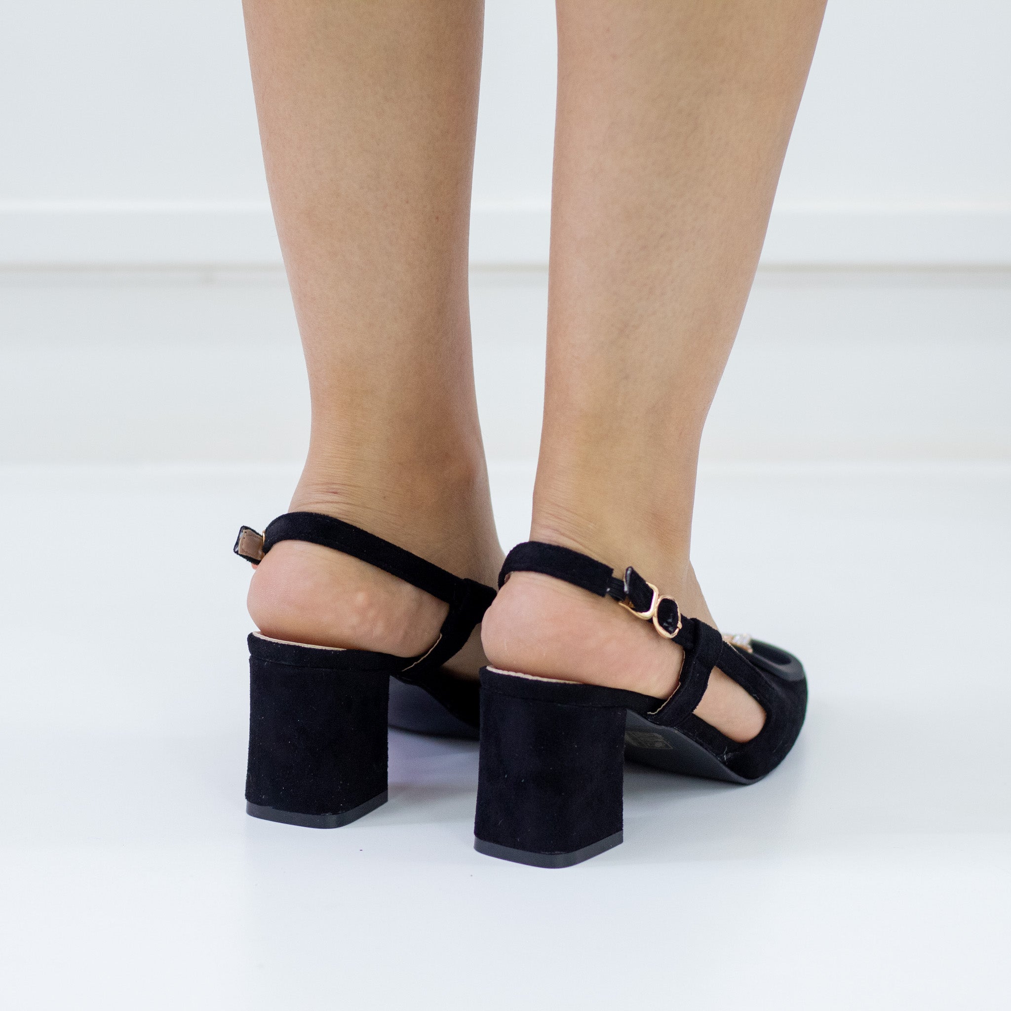 Black 6cm heel suide sling back with a gold trim olsen