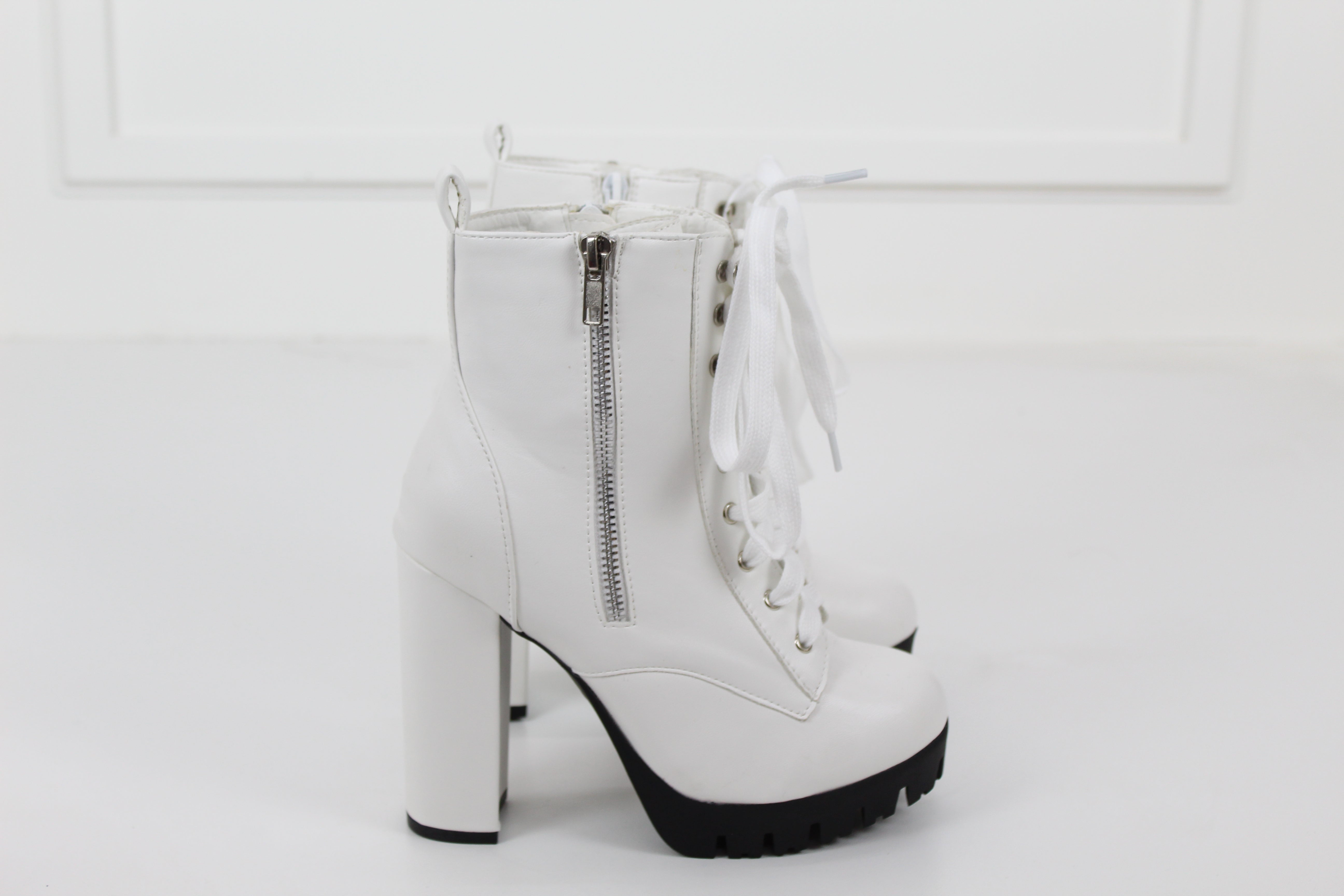 White lace up 11cm heel cleated sole ankle boot veronica