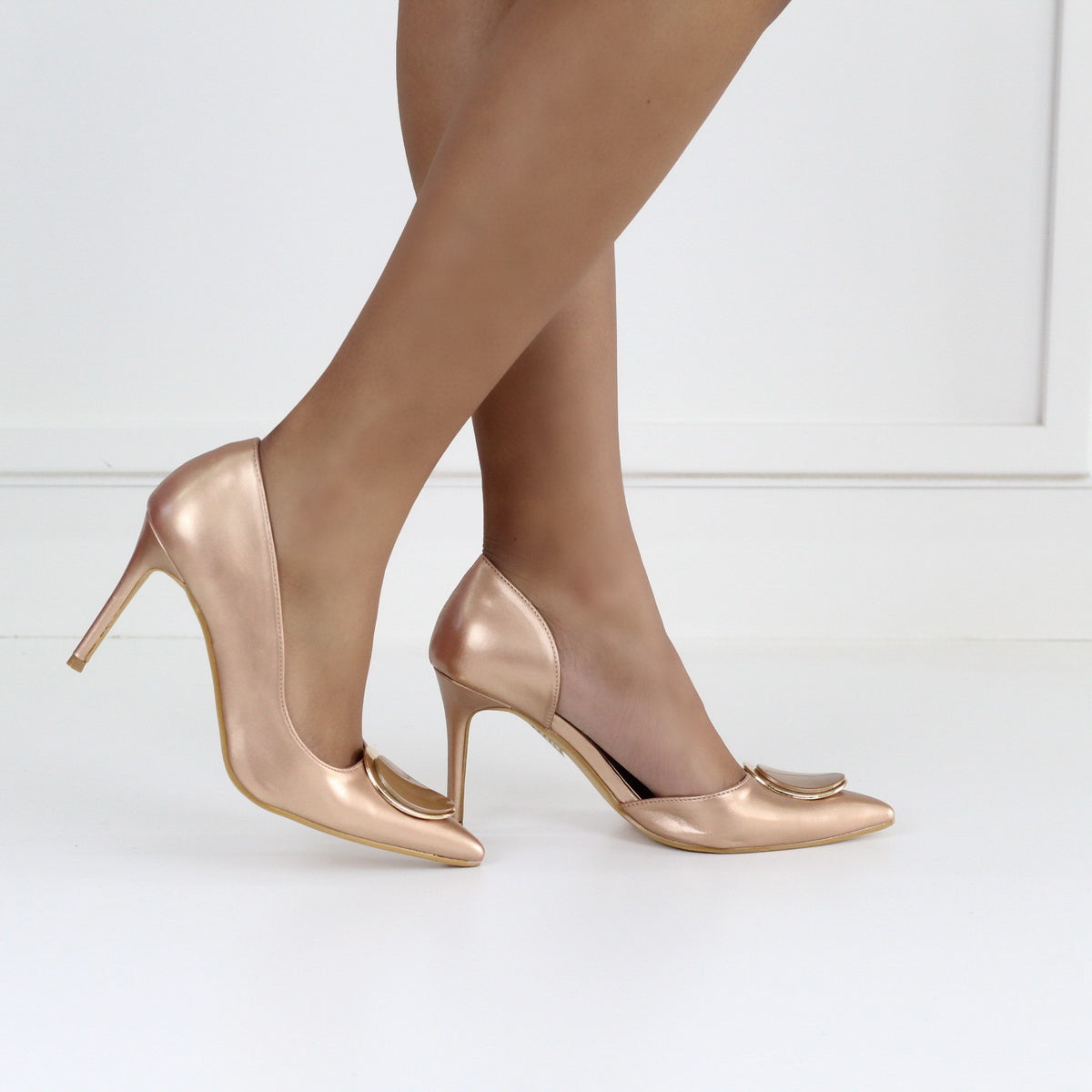 Rose gold 9cm heel open side court shoe with a gold trim daniella