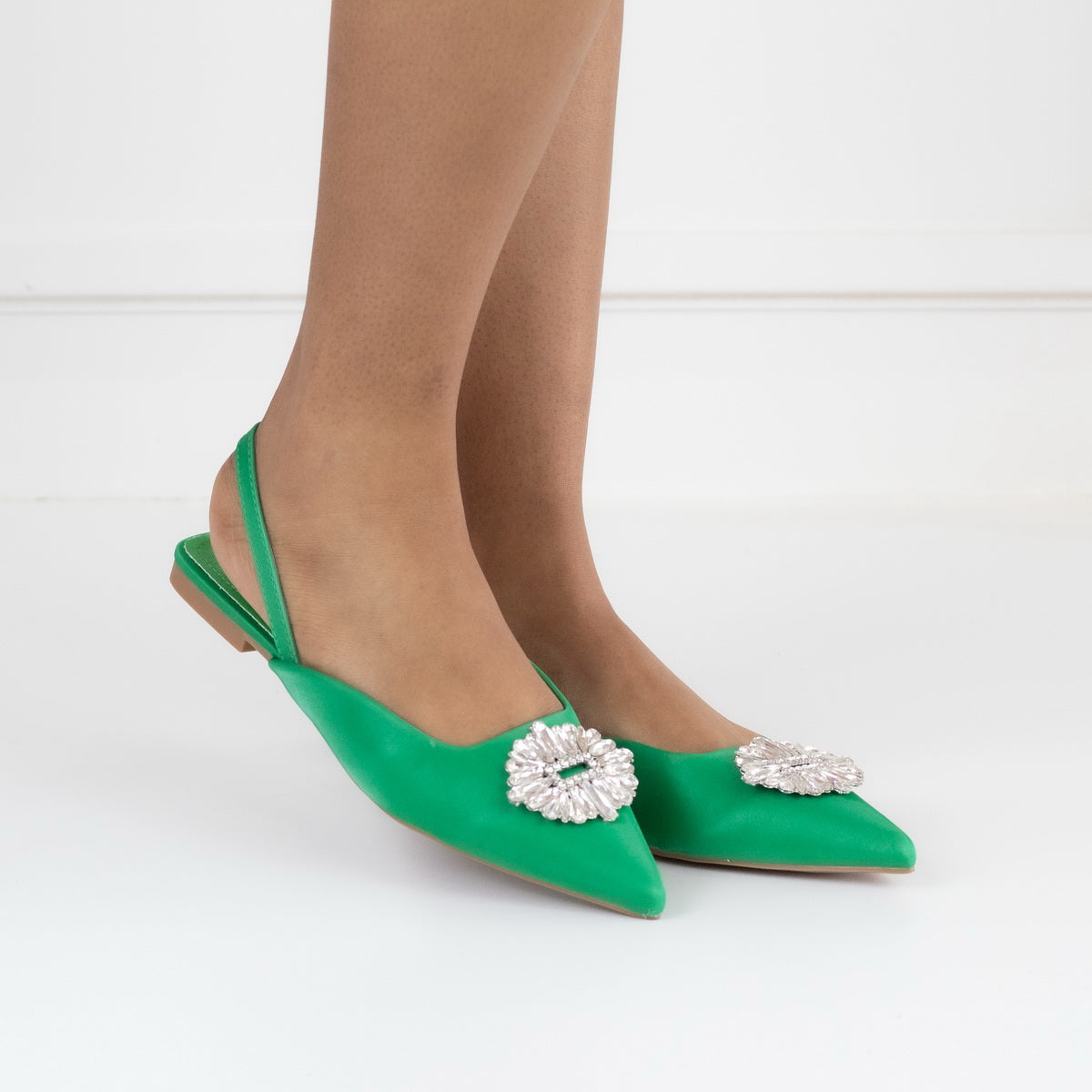 Green pointy sling back pump with a trim erina
