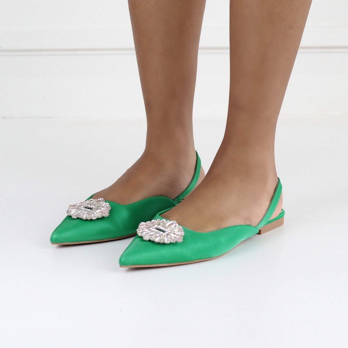 Erina pointy sling back pump with a trim green