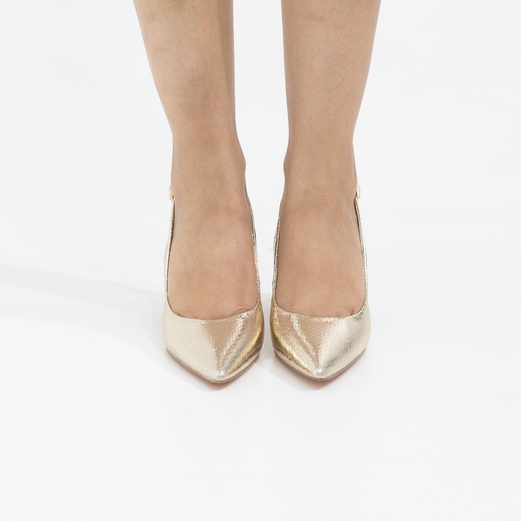 Gold pointy sling back on a 9cm block heel prisha