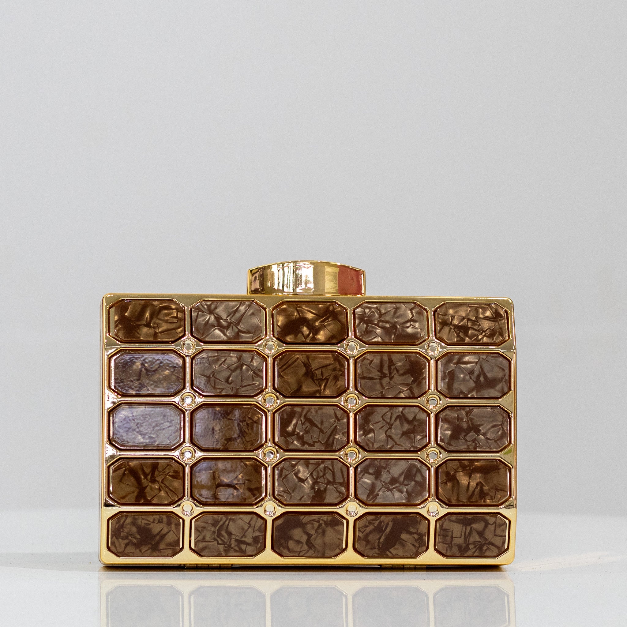 Gold tiled detailed capsule clutch bag xeno
