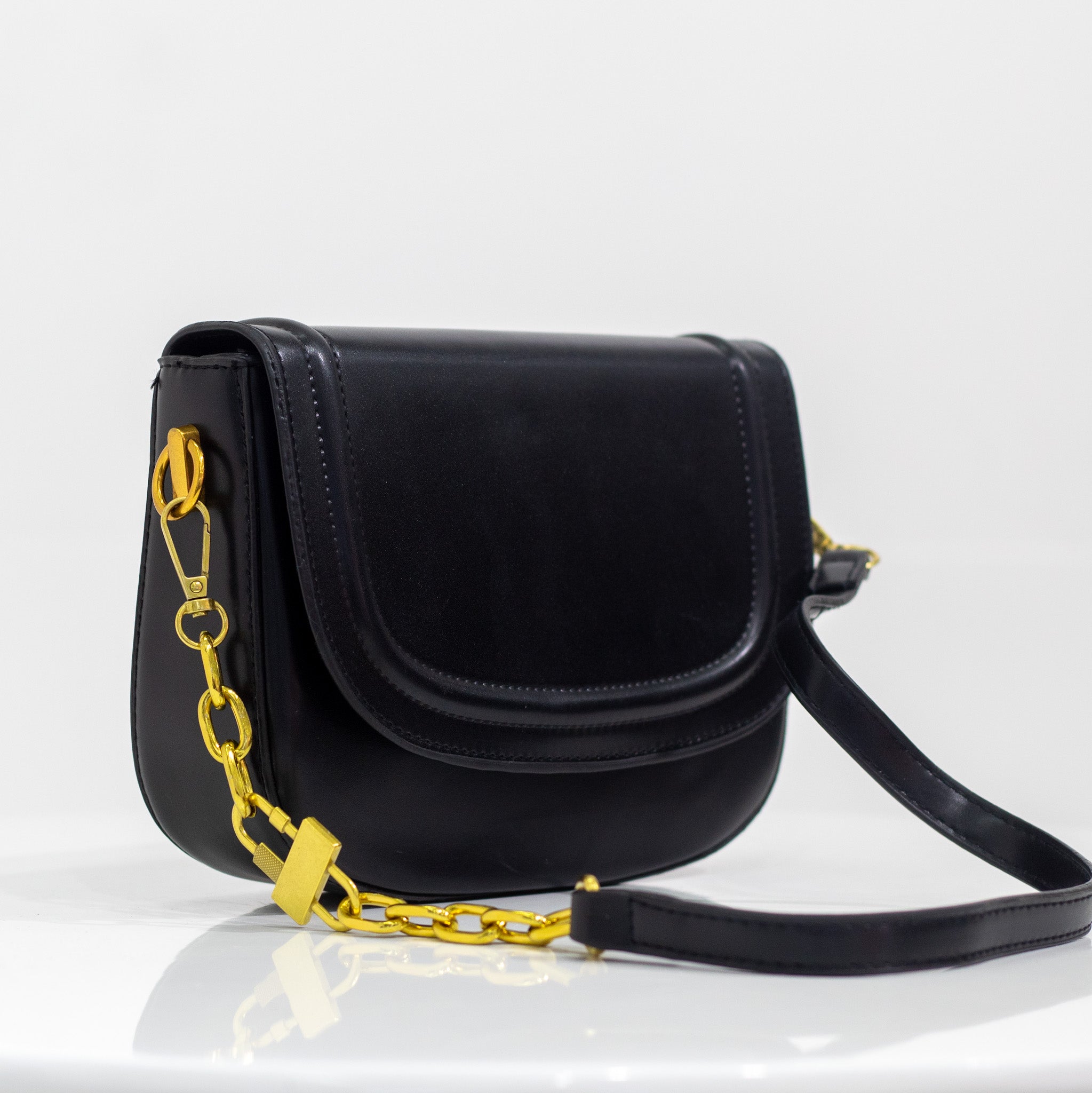 Black faux leather saddle bag quentin