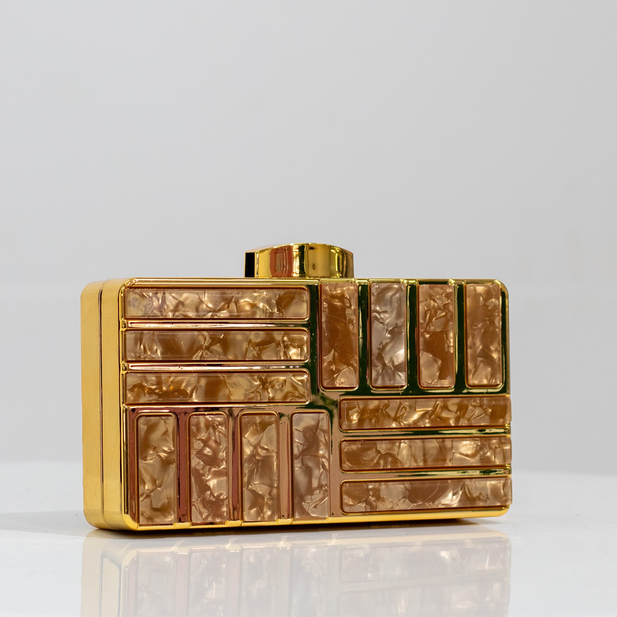Gold piano buttoned detailed capsule clutch bag xiana