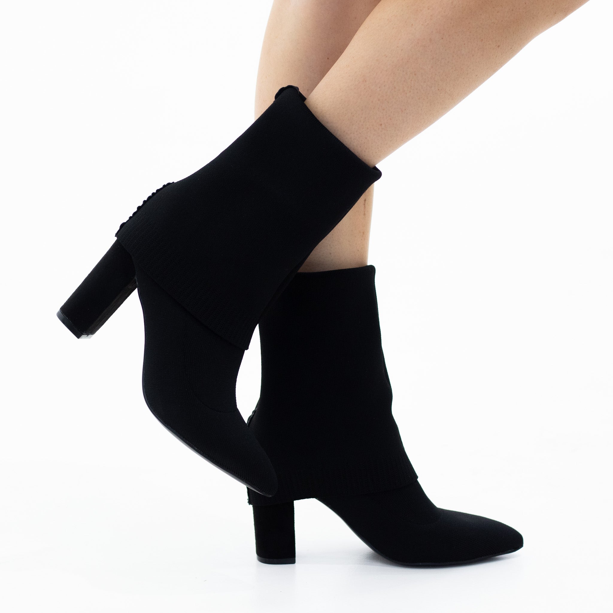 Black stretch fabric knee high boot on a 9cm heel vadisa